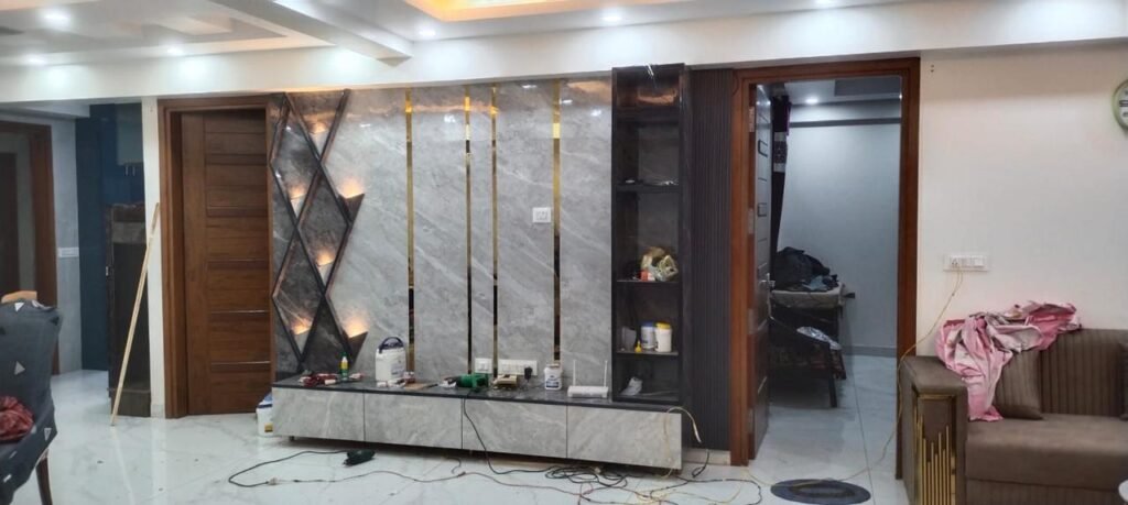 Marble TV unit wall with gold strips
